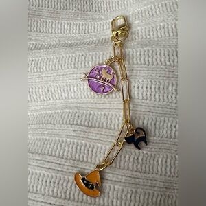 Gold Chain Bracelet with Purple and Black Charms